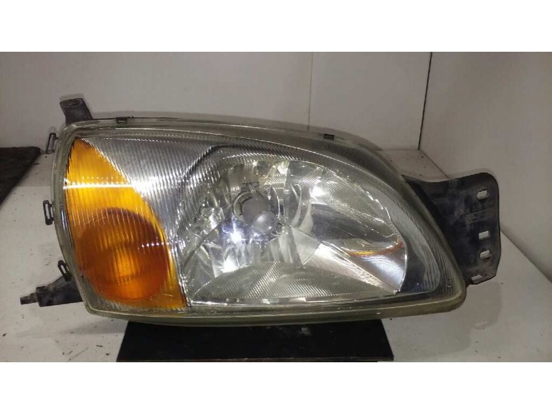 Recambio de faro derecho para ford fiesta berlina básico referencia OEM IAM 0301173302  2ª SERIE