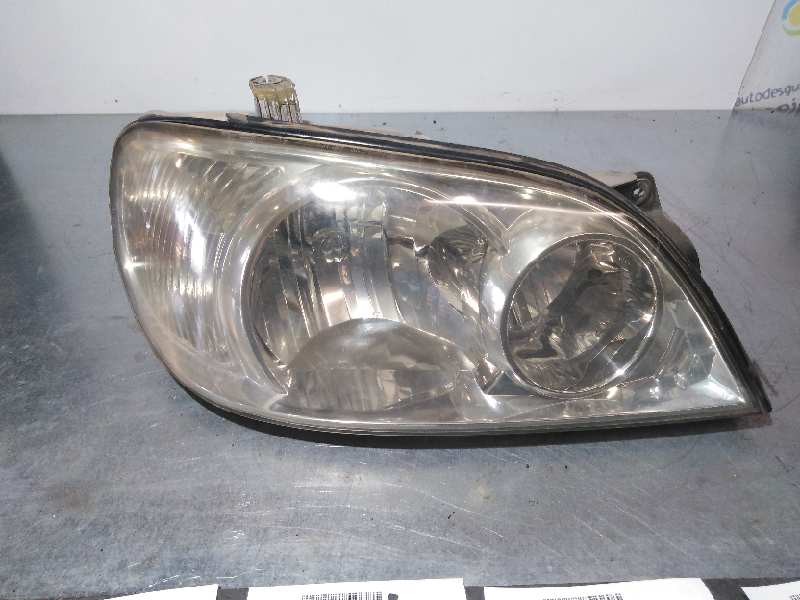 Recambio de faro derecho para kia carnival ii 2.9 cdri ex referencia OEM IAM  BIFARO SOPORTE REPARADO