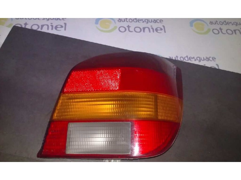 Recambio de piloto trasero derecho para ford fiesta berlina ghia referencia OEM IAM  89 