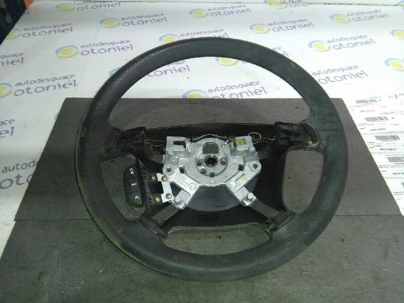 Recambio de volante para daewoo tacuma cdx referencia OEM IAM 111615130 DW111615130 4 RADIOS