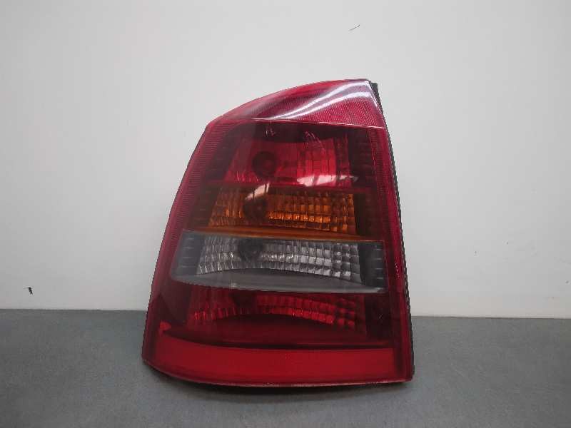 Recambio de piloto trasero izquierdo para opel astra g coupé básico referencia OEM IAM 16622Z RAJADO POR DENTRO BERTONE