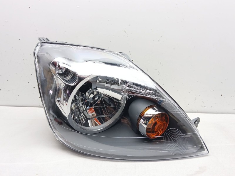 Recambio de faro derecho para ford fiesta (cbk) referencia OEM IAM 1415694  