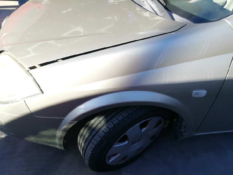 Recambio de aleta delantera izquierda para nissan primera berlina (p12) acenta referencia OEM IAM  GOLPE PEQUEÑO 