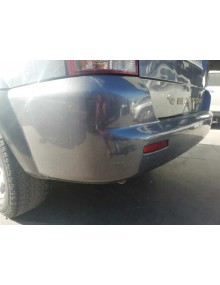 Recambio de paragolpes trasero para ssangyong rexton 2.7 turbodiesel cat referencia OEM IAM  GRIS OSCURO  2