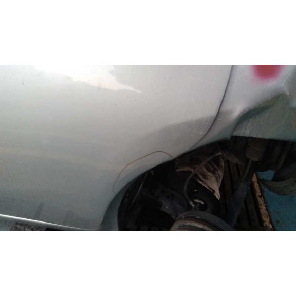 Recambio de puerta trasera izquierda para nissan note acenta referencia OEM IAM  PLATA 