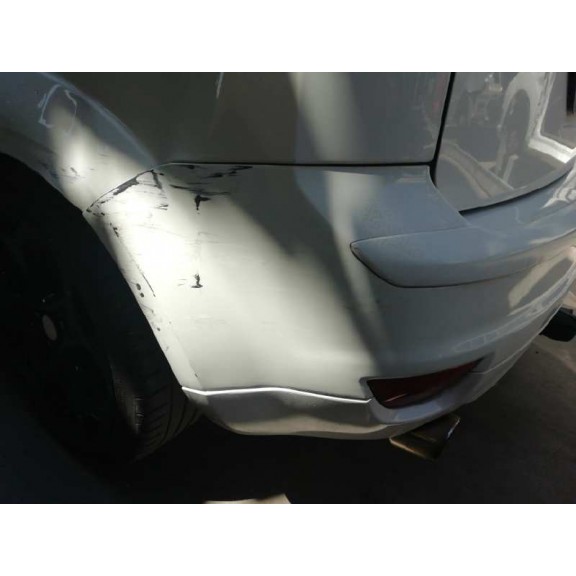 Recambio de paragolpes trasero para ford focus berlina (cap) ambiente (d) referencia OEM IAM  VER FOTOS 