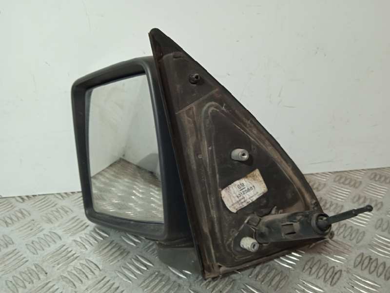 Recambio de retrovisor izquierdo para opel combo (corsa c) familiar referencia OEM IAM 13125881  MANUAL MECANICO