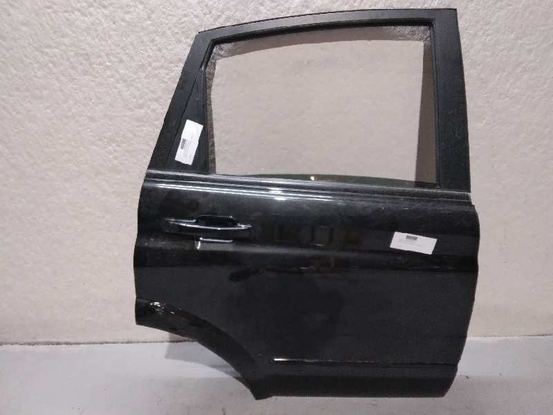 Recambio de puerta trasera derecha para ssangyong actyon 200 xdi referencia OEM IAM 6302131104 ROZADA SIN ACCESORIOS