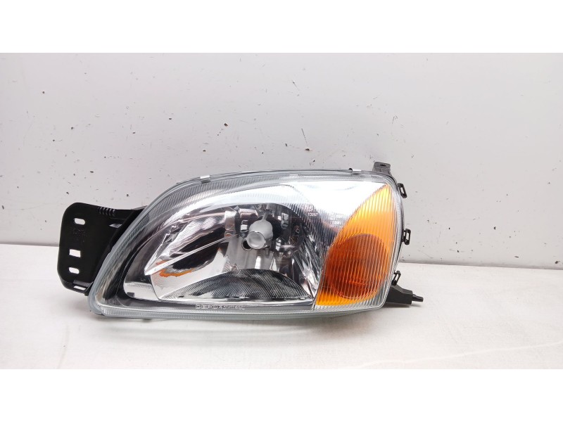 Recambio de faro izquierdo para ford fiesta courier (dx) 1.8 diesel cat referencia OEM IAM 1127897  