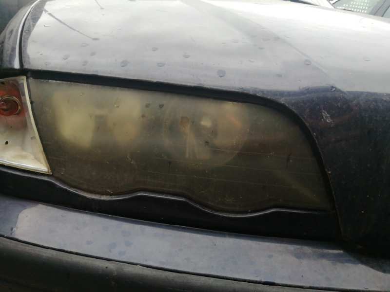 Recambio de faro derecho para bmw serie 3 touring (e46) 320d referencia OEM IAM 69027046 1º 0301089206