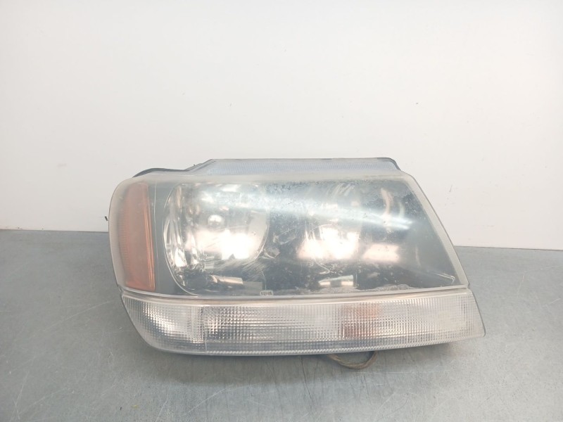 Recambio de faro izquierdo para jeep grand cherokee ii (wj, wg) 4.0 4x4 referencia OEM IAM 68086539AA  
