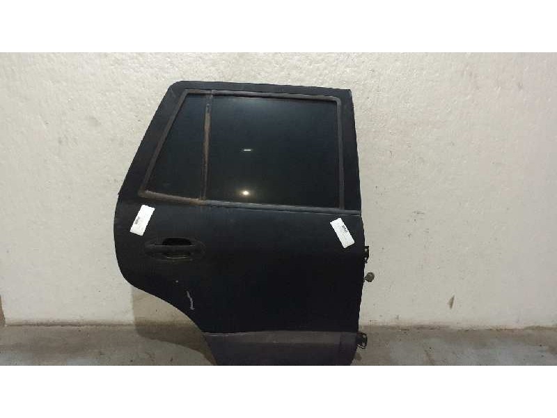 Recambio de puerta trasera derecha para hyundai santa fe (sm) 2.0 crdi vgt comfort referencia OEM IAM  NEGRO 