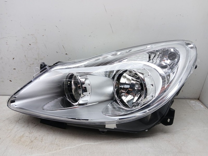 Recambio de faro izquierdo para opel corsa d innovation referencia OEM IAM 1216189 fondo cromo nuevo
