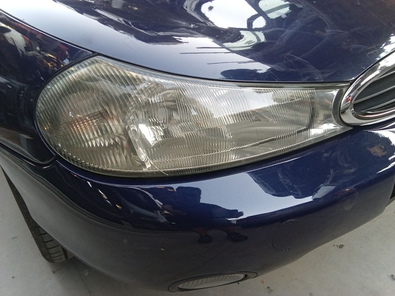 Recambio de faro derecho para ford mondeo ii (bap) 1.8 td referencia OEM IAM 0301098206  