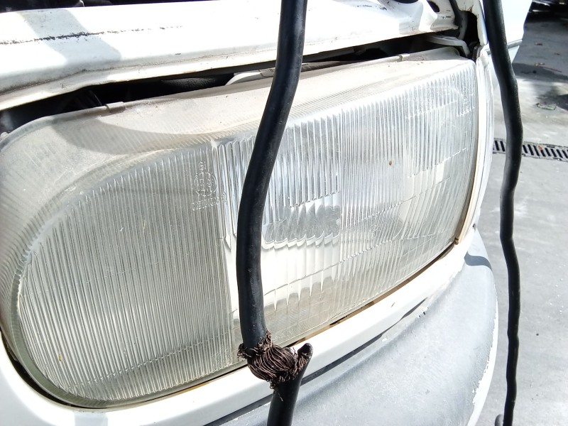 Recambio de faro izquierdo para nissan serena (c23) 2.3 d referencia OEM IAM 260608C002  