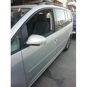 PUERTA DELANTERA IZQUIERDA VARIOS GOLPES 