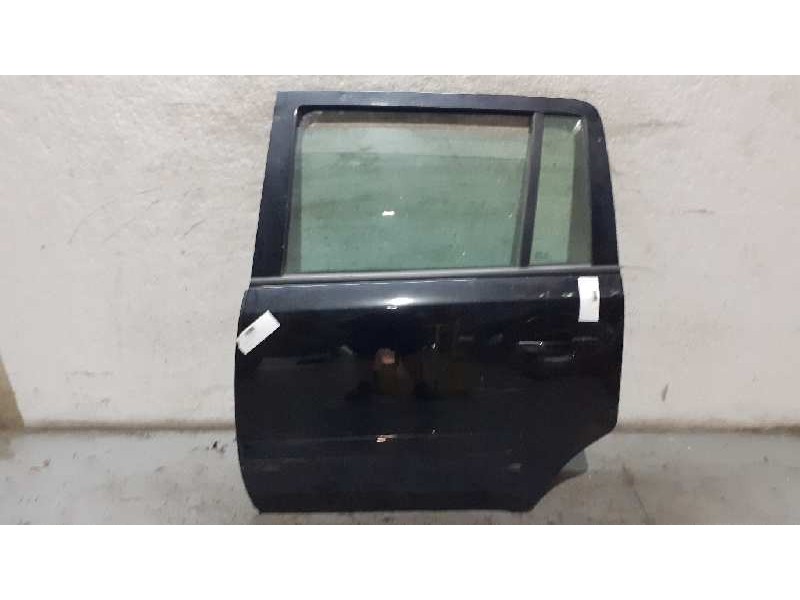 Recambio de puerta trasera izquierda para opel zafira b family referencia OEM IAM  NEGRA GOLPEADA