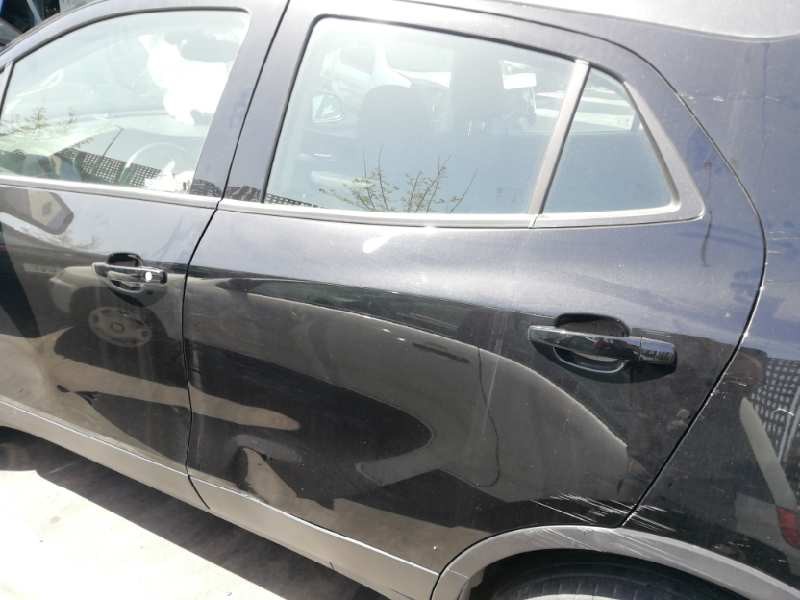 Recambio de puerta trasera izquierda para opel mokka x selective start/stop referencia OEM IAM  MUY TOCADA 